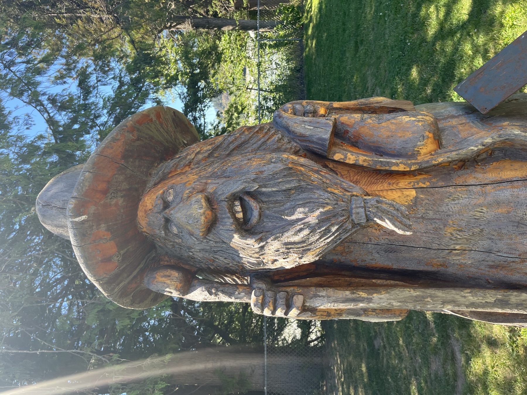 One of Hope's large wooden carved figures in the riverside park